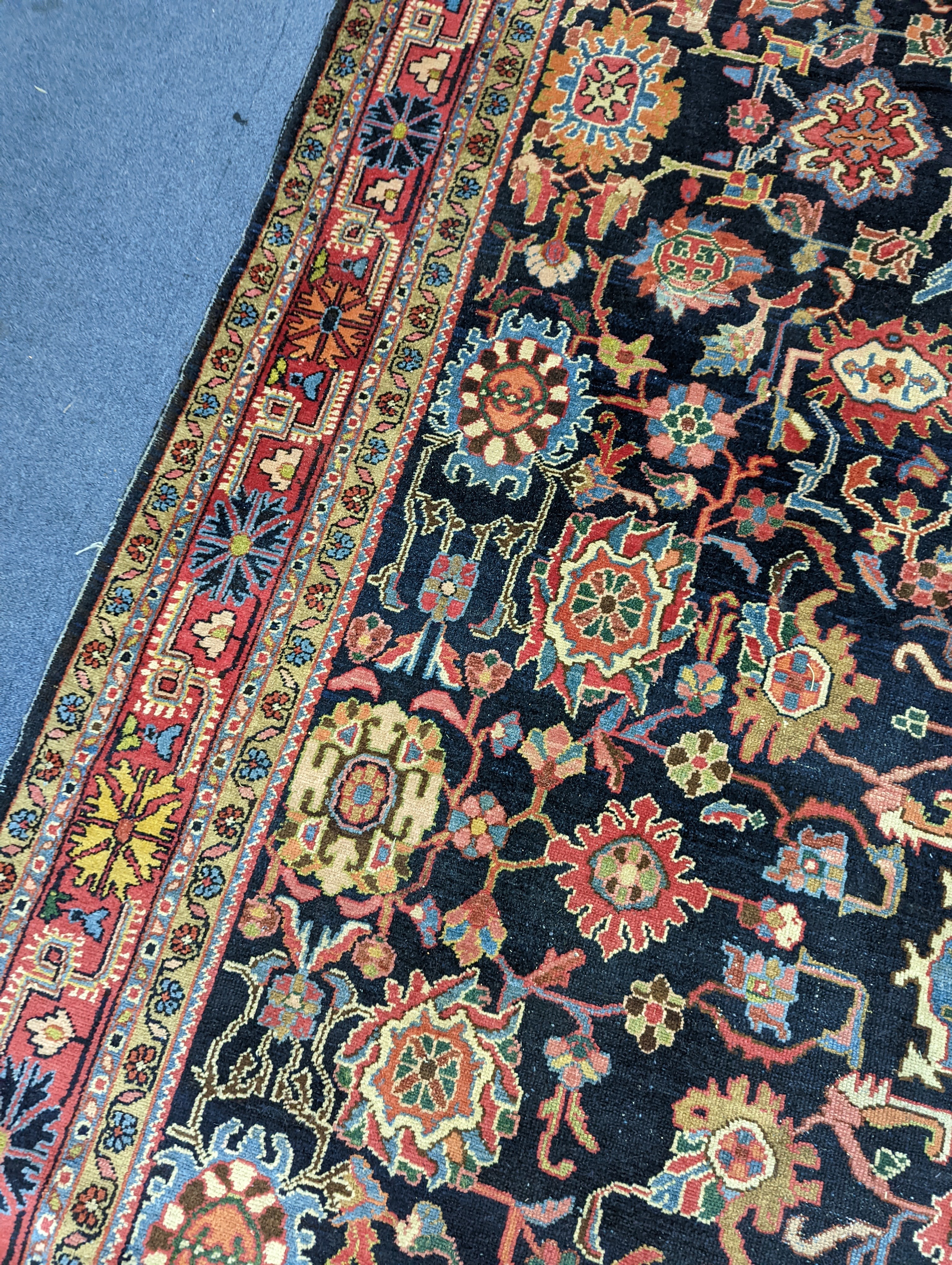 A Heriz / Moghal blue ground carpet, 340 x 206cm